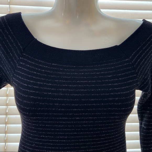 Bebe women black and silver stripes long sleeves fitted top. Size M/L. Used - Picture 2 of 9